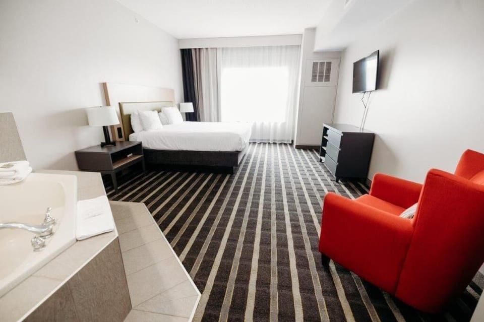 Deluxe Suite, 1 Bedroom, Non Smoking | Premium bedding, in-room safe, desk, laptop workspace