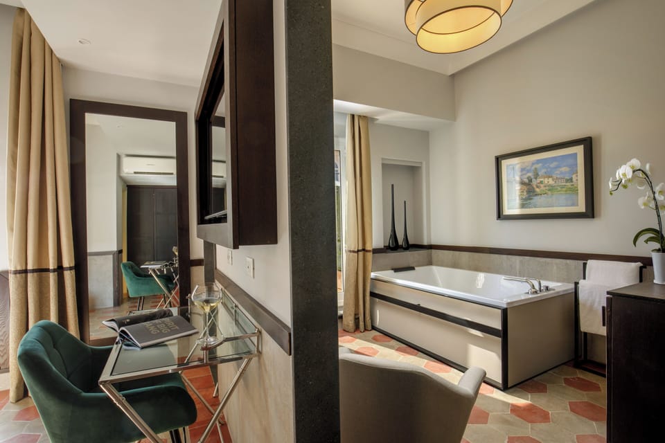 Suite, Terrace | Living area | 42-inch flat-screen TV with satellite channels, TV