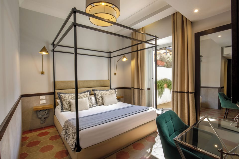Suite, Terrace | Minibar, in-room safe, soundproofing, free WiFi