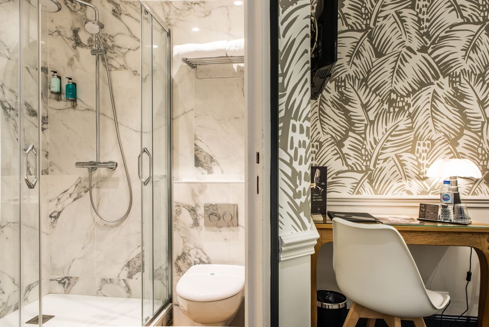 Classic Double Room | Bathroom | Rainfall showerhead, eco-friendly toiletries, hair dryer, towels