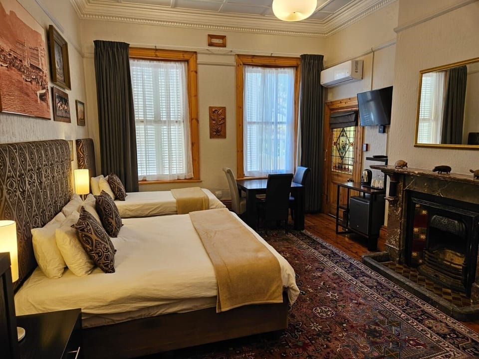 Family Triple Room | In-room safe, blackout drapes, iron/ironing board, free WiFi