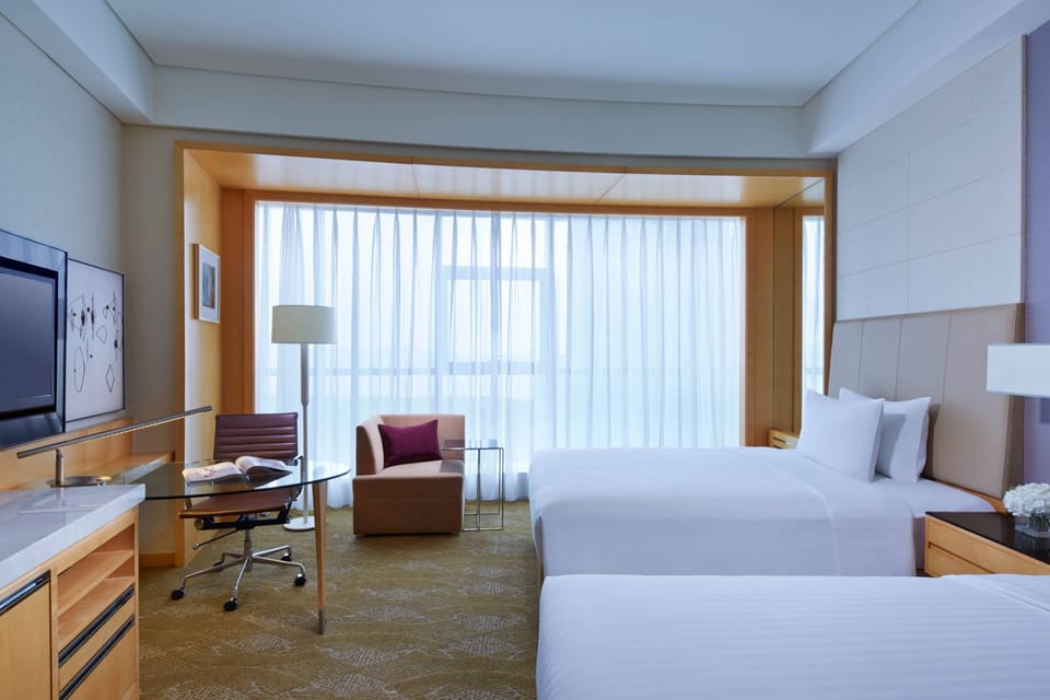 Down comforters, pillowtop beds, minibar, in-room safe