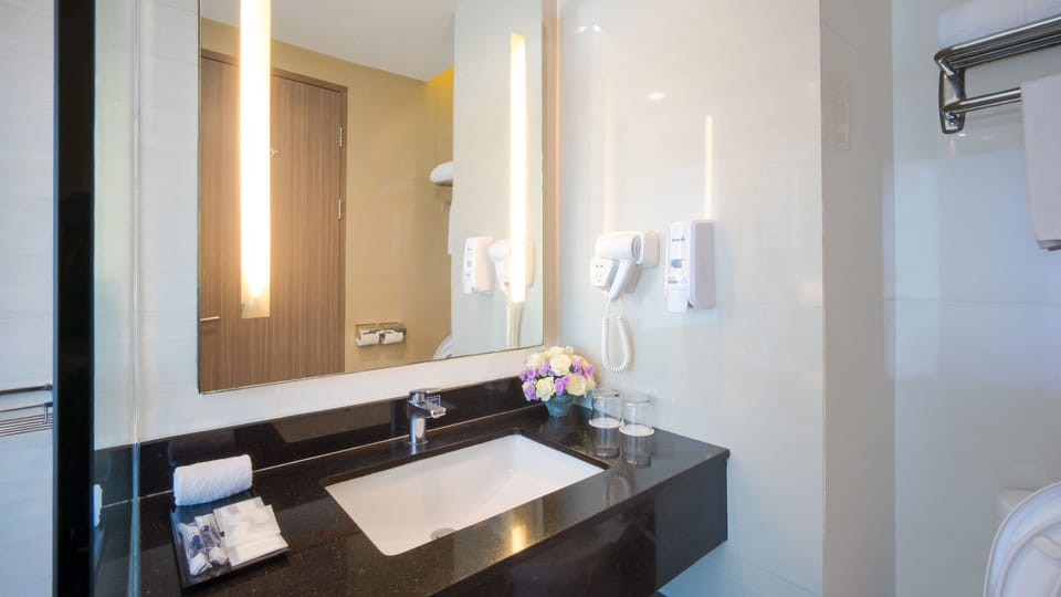 Shower, free toiletries, hair dryer, slippers