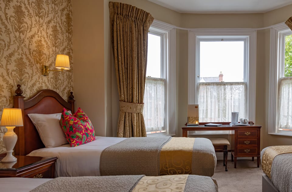 Family Room | In-room safe, desk, laptop workspace, blackout drapes