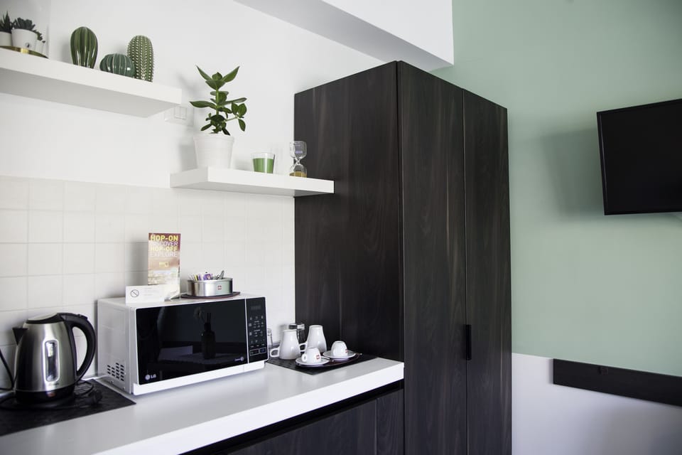 Deluxe Double Room, City View | In-room safe, iron/ironing board, free cribs/infant beds, free WiFi