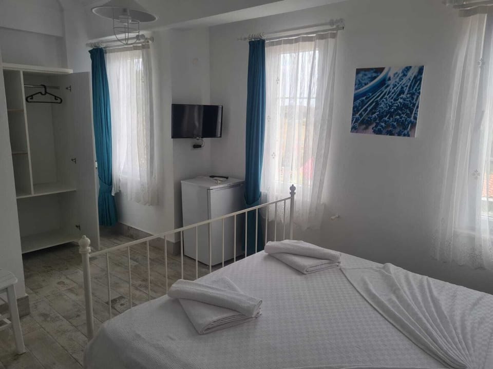 Deluxe Triple Room, Garden View | Free WiFi