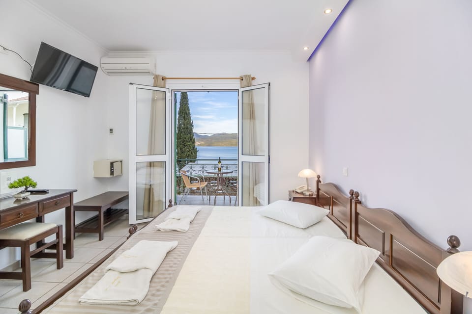 Double Room, Sea View | In-room safe, blackout drapes, iron/ironing board, free WiFi