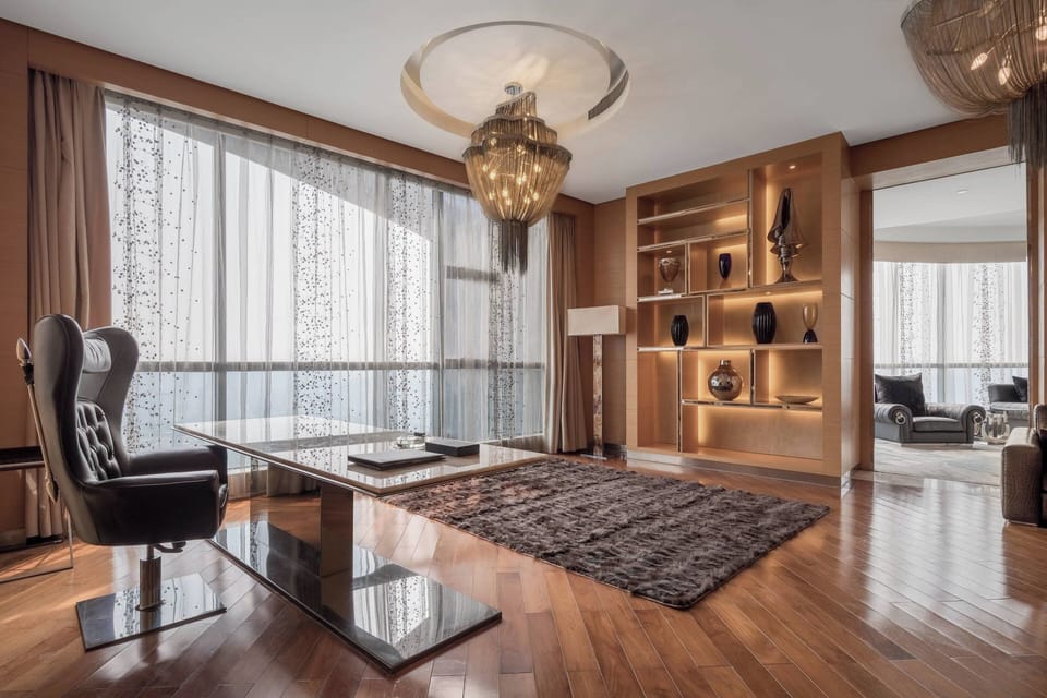 Presidential Suite, 1 King Bed | Living room | 55-inch TV with cable channels