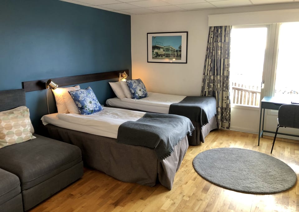 Family Room | Blackout drapes, WiFi (free), bed sheets