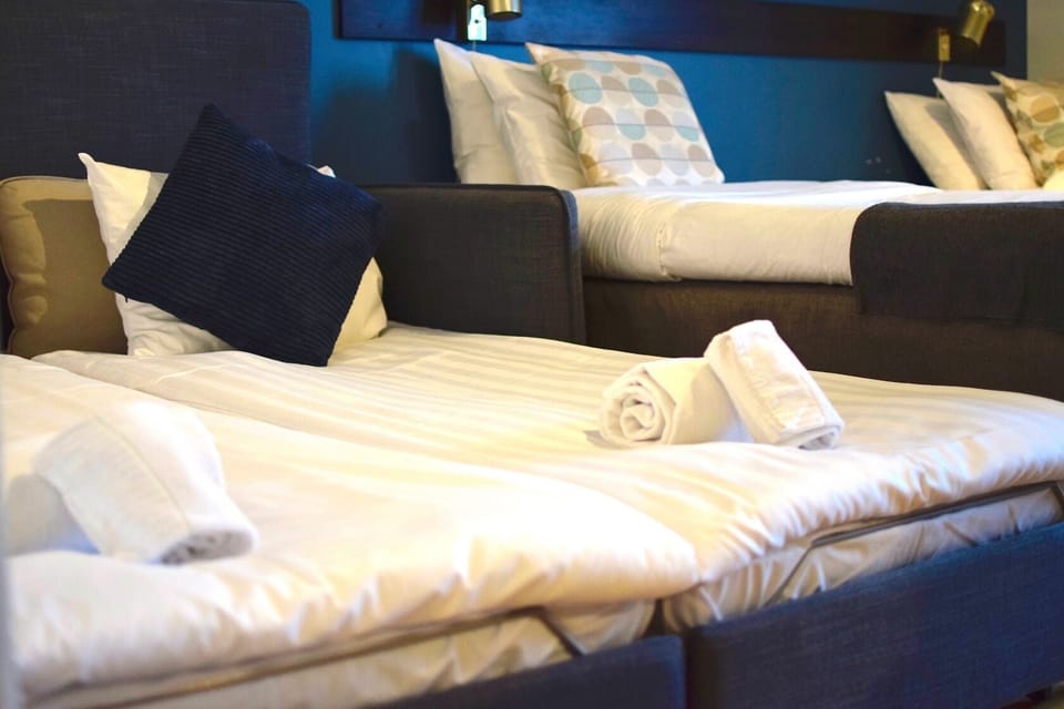 Family Room | Blackout drapes, WiFi (free), bed sheets