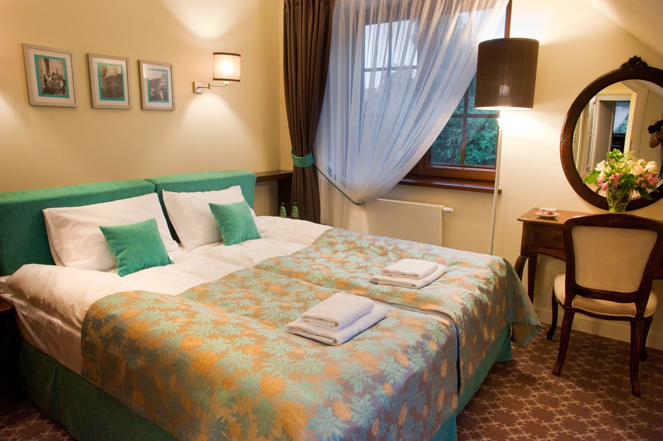 Apartment, 2 Bedrooms | In-room safe, individually decorated, desk, iron/ironing board