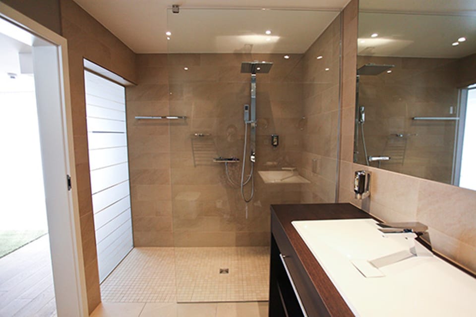 Shower, rainfall showerhead, hair dryer, towels