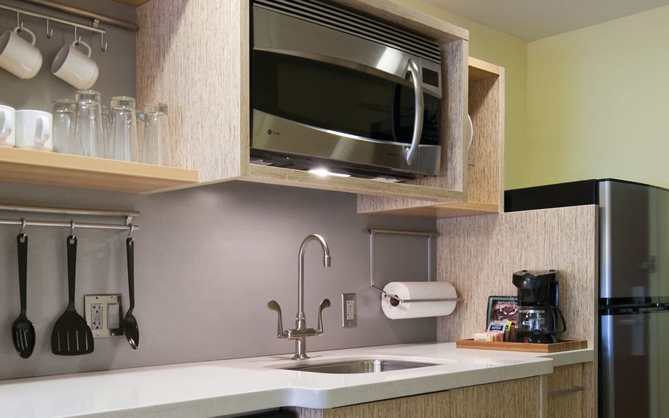 Studio, 2 Queen Beds | Private kitchenette | Full-size fridge, microwave, stovetop, dishwasher