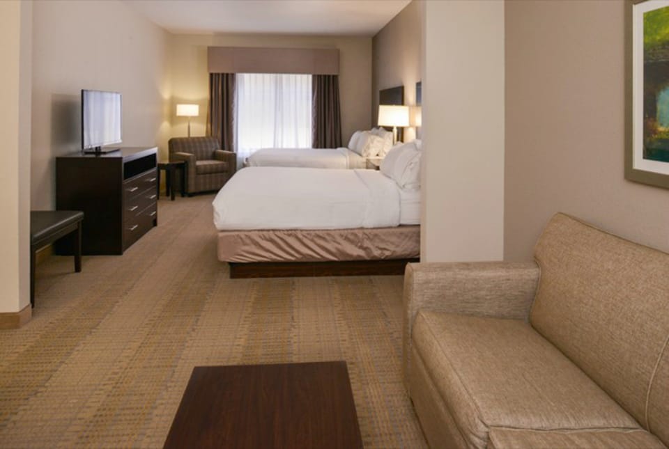 Hypo-allergenic bedding available, down comforters, desk