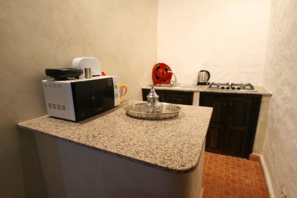 Traditional Cottage | Private kitchenette | Coffee/tea maker, highchair, paper towels