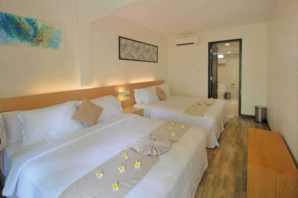 Deluxe Garden Room | Premium bedding, free minibar items, in-room safe, free WiFi