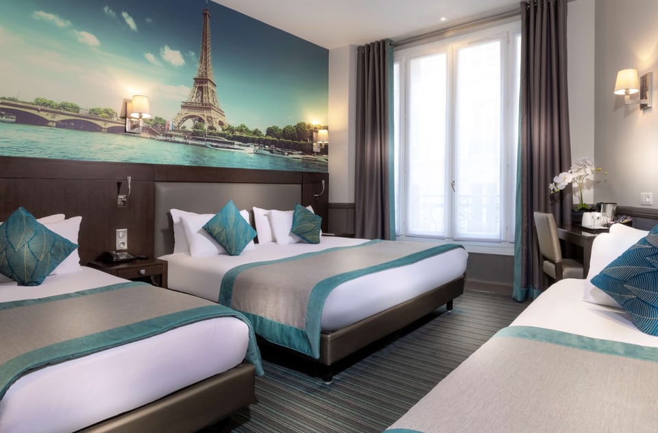 Quadruple Room | Minibar, in-room safe, desk, soundproofing