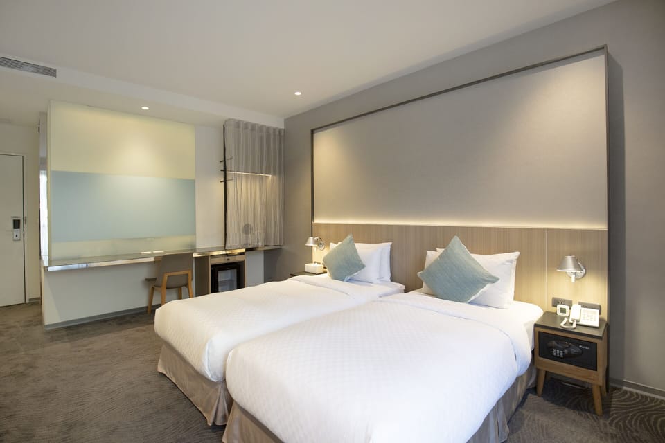 Deluxe Twin Room, 2 Twin Beds, Balcony | Free minibar, in-room safe, desk, laptop workspace