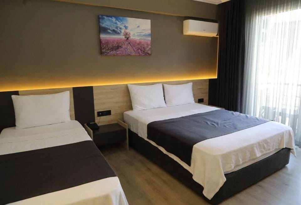 Standard Triple Room | Premium bedding, minibar, free WiFi, bed sheets