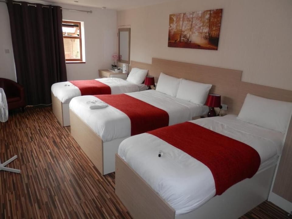 Standard Suite, Private Bathroom | Individually furnished, desk, laptop workspace, free WiFi