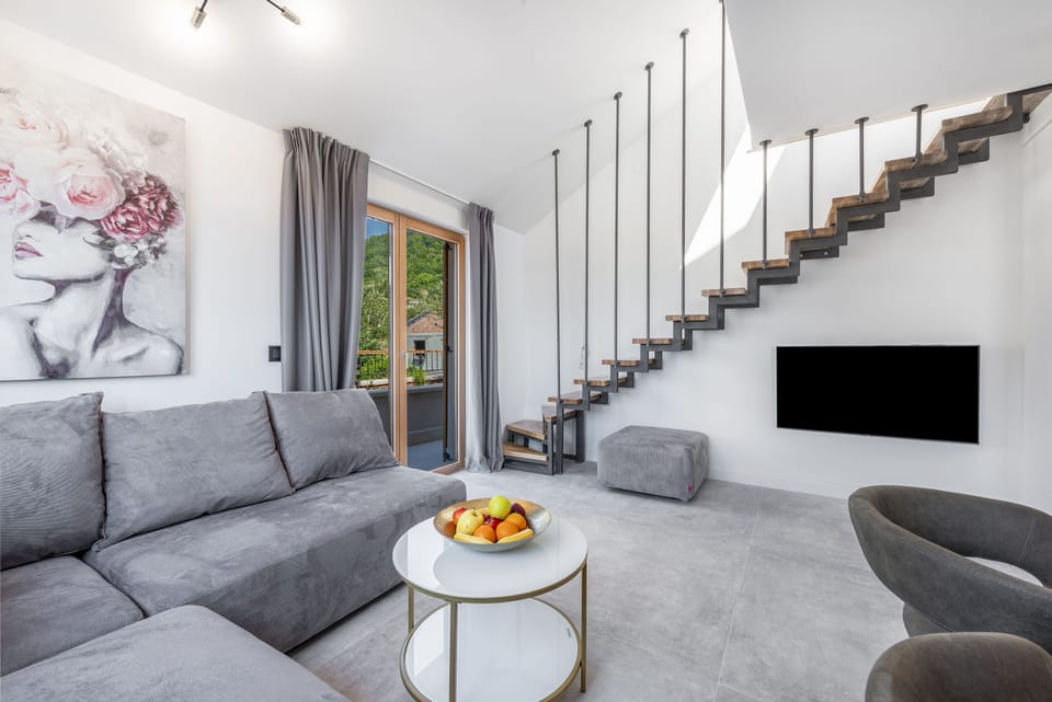 Family Apartment, 3 Bedrooms, Sea View | Living area | 40-inch LCD TV with cable channels, TV