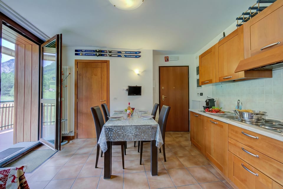 Family Studio, Mountain View (La Marmotta Campo Smith on the Ski) | Private kitchen | Fridge, microwave, stovetop, coffee/tea maker
