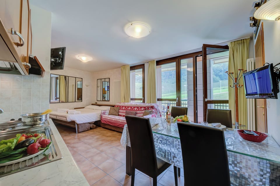 Family Studio, Mountain View (La Marmotta Campo Smith on the Ski) | Living room | 21-inch Smart TV with cable channels