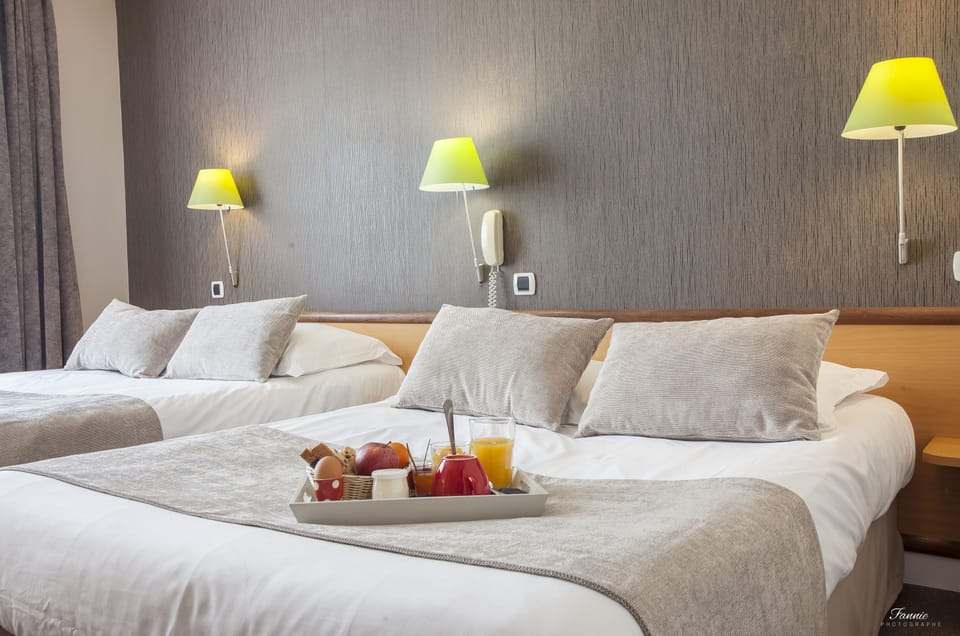 Comfort Quadruple Room | Premium bedding, minibar, desk, blackout drapes