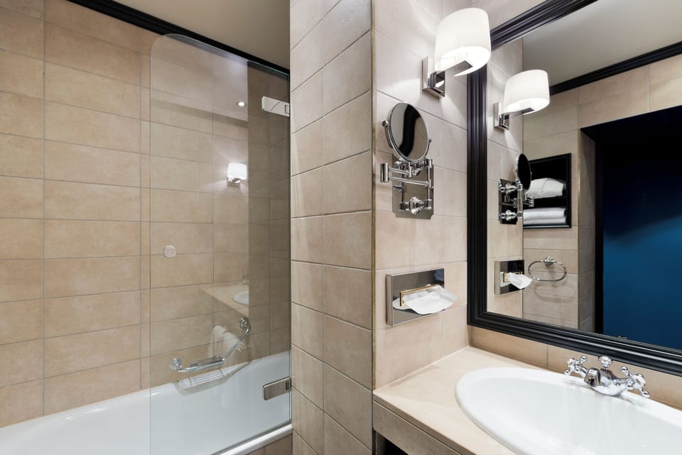 Combined shower/tub, eco-friendly toiletries, hair dryer, bathrobes
