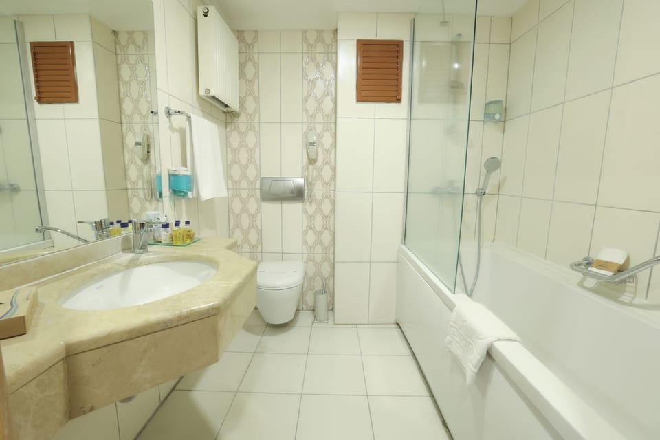 Standard Room | Bathroom | Bathtub, deep soaking tub, hair dryer, towels