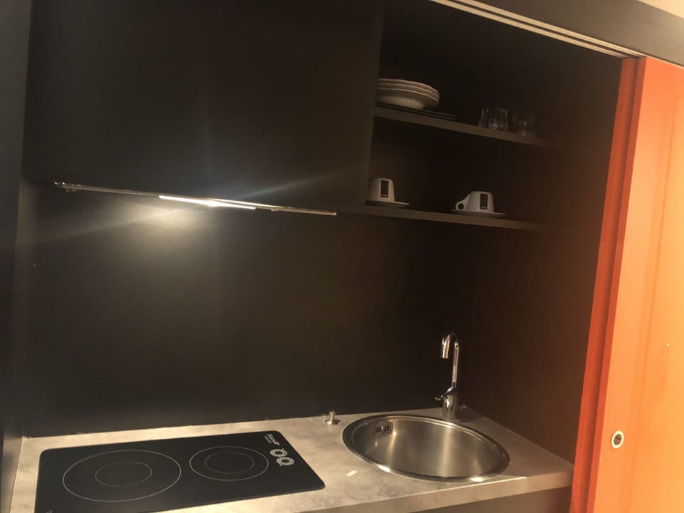 Shared fridge, microwave, espresso maker, coffee/tea maker