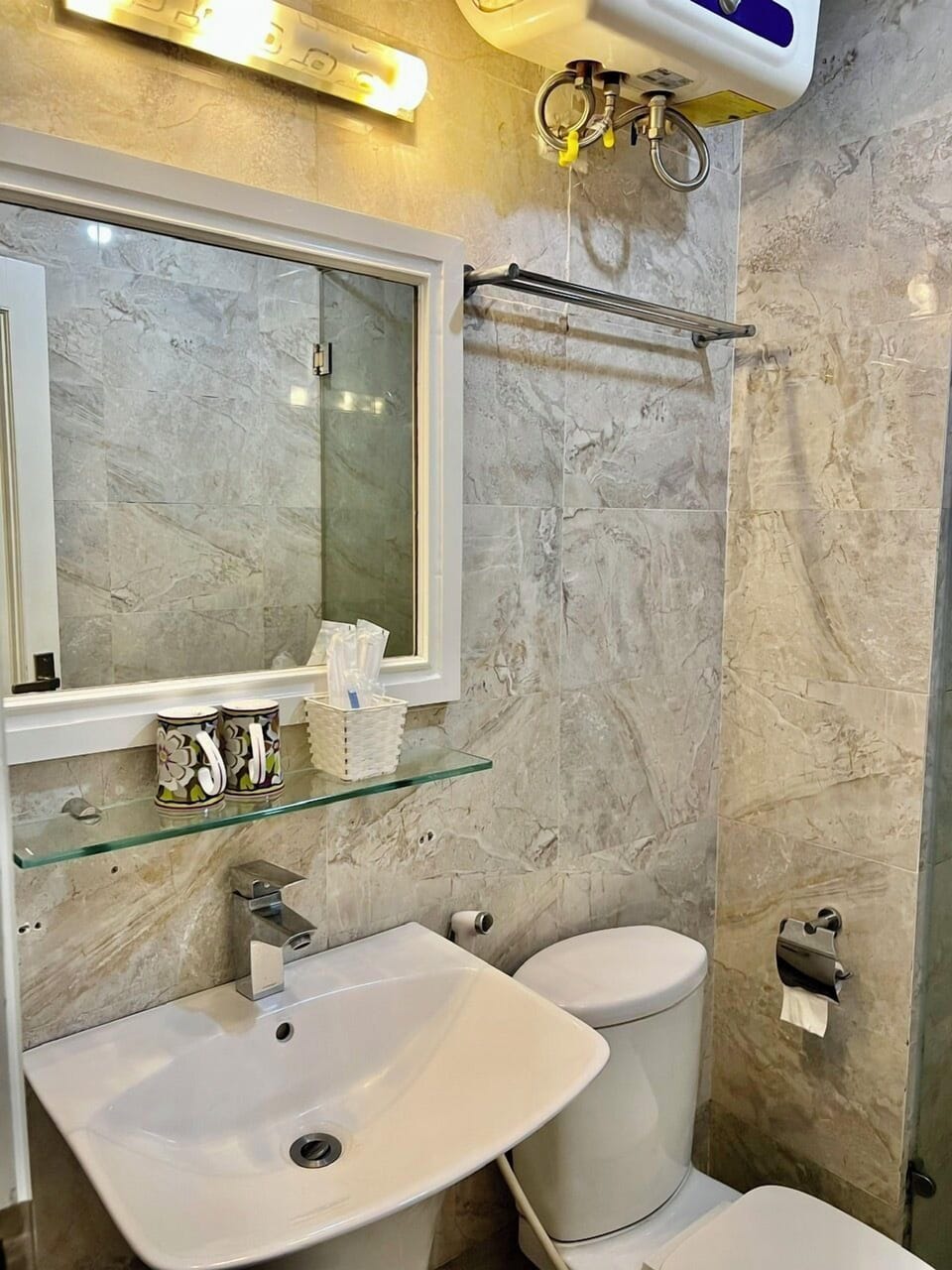 Standard Room | Bathroom | Rainfall showerhead, designer toiletries, hair dryer, bathrobes