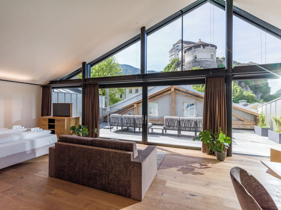 Deluxe Studio Suite, 1 Bedroom, Non Smoking, Sauna | Living area | 43-inch Smart TV with cable channels, TV
