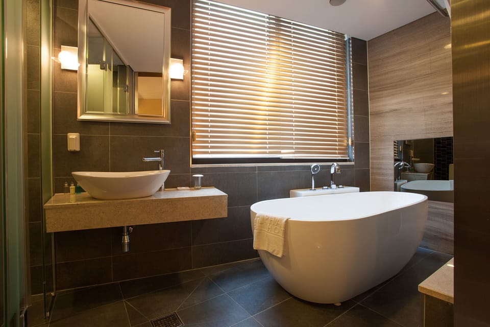 Superior Double Room (Bigger than most in Seoul) | Bathroom | Separate tub and shower, hair dryer, bathrobes, slippers
