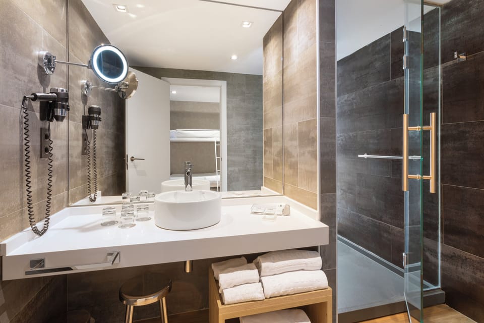 Family Room | Bathroom | Eco-friendly toiletries, hair dryer, towels