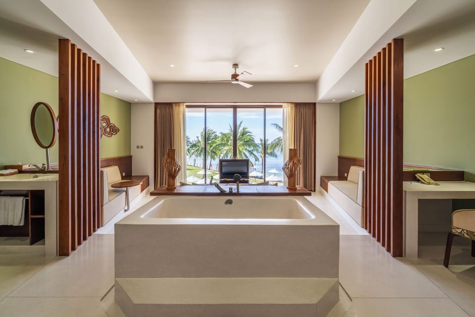 Premium Room, Ocean View | Bathroom | Separate tub and shower, rainfall showerhead, free toiletries