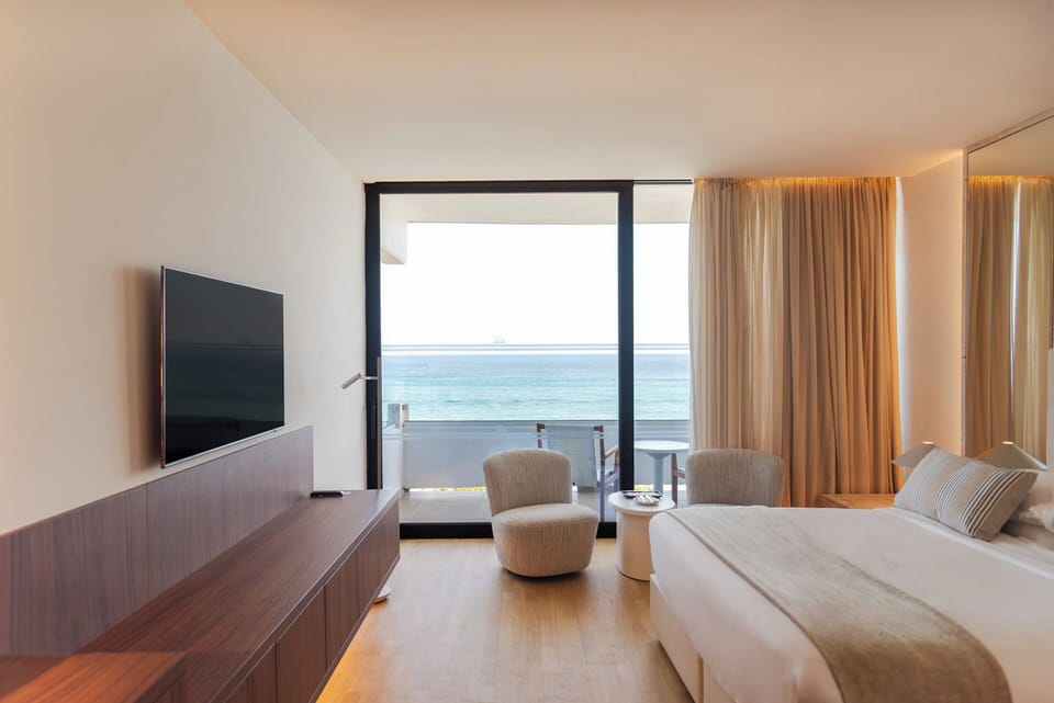 Superior Sea View Room | Minibar, in-room safe, desk, laptop workspace