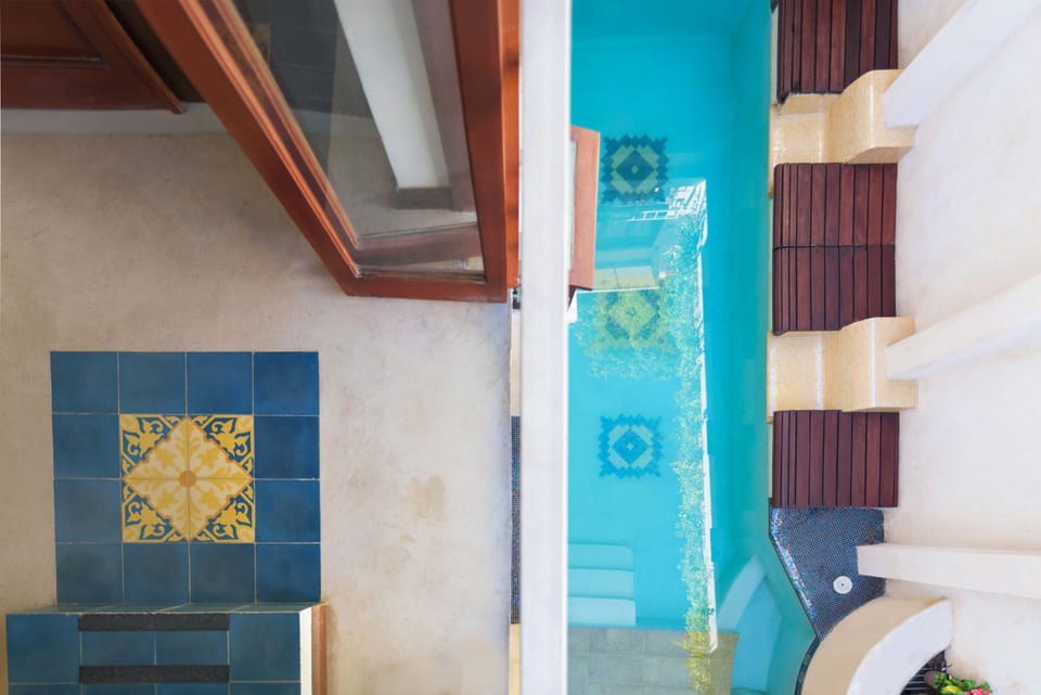 Outdoor pool, open 8 AM to 10:00 PM, pool umbrellas, sun loungers