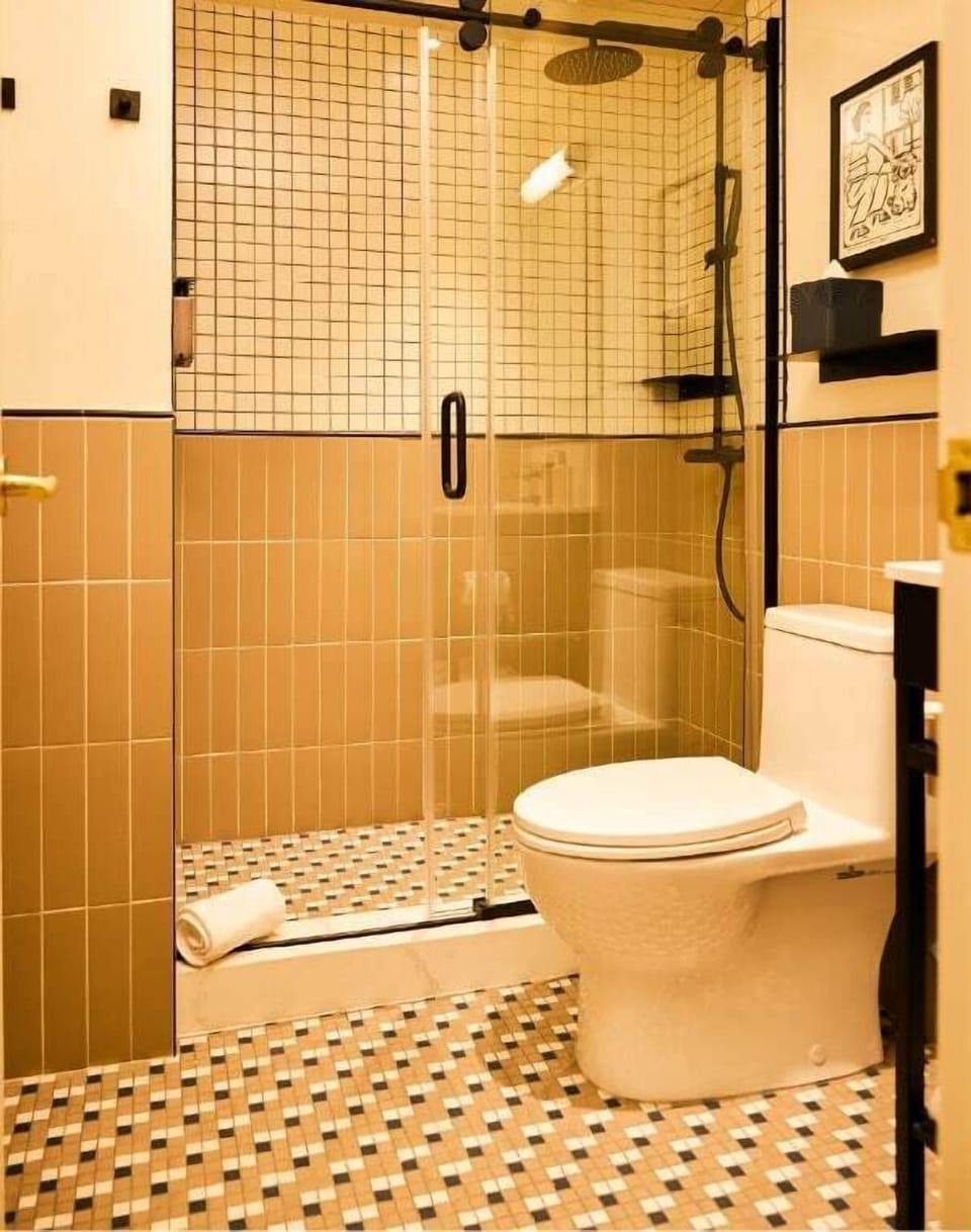 Shower, rainfall showerhead, designer toiletries, hair dryer