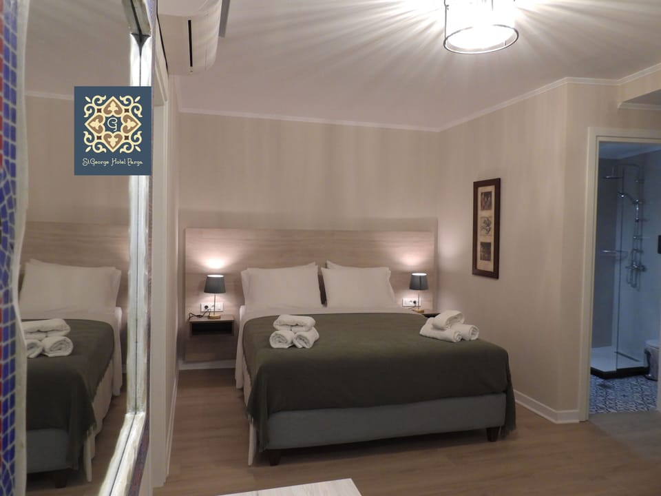Premium bedding, memory foam beds, minibar, in-room safe