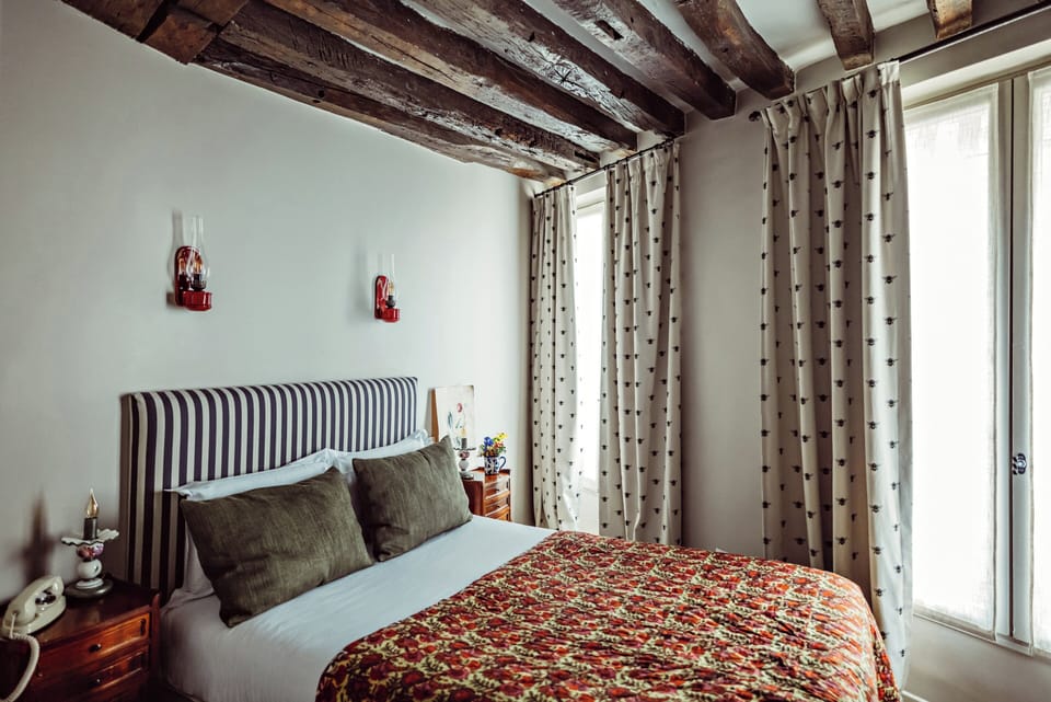 Executive Double Room | Minibar, in-room safe, desk, blackout drapes