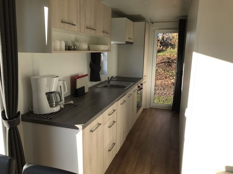 Cabin, 2 Bedrooms, Patio | Private kitchen | Fridge, coffee/tea maker, electric kettle, toaster