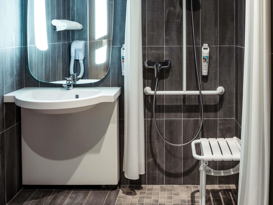 Eco-friendly toiletries, hair dryer, towels, soap