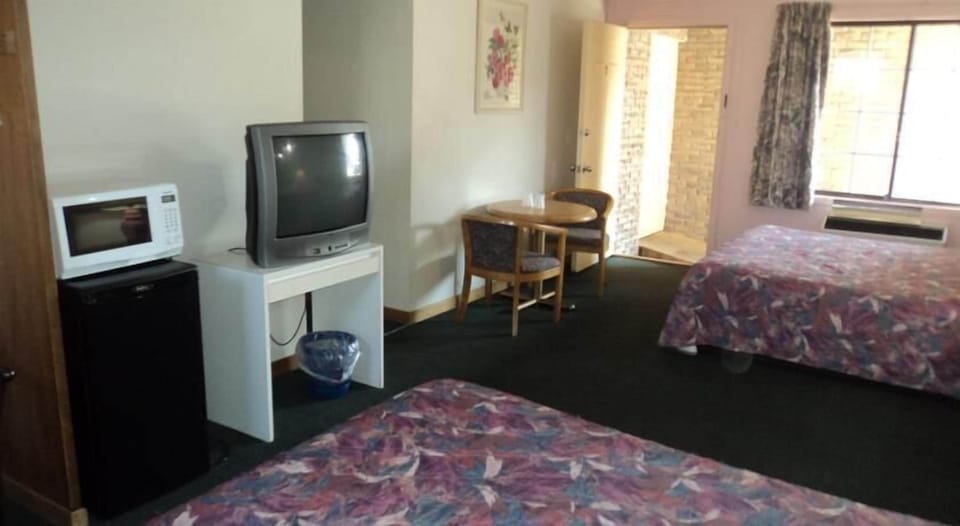 Room, 2 Queen Beds | Living area | TV