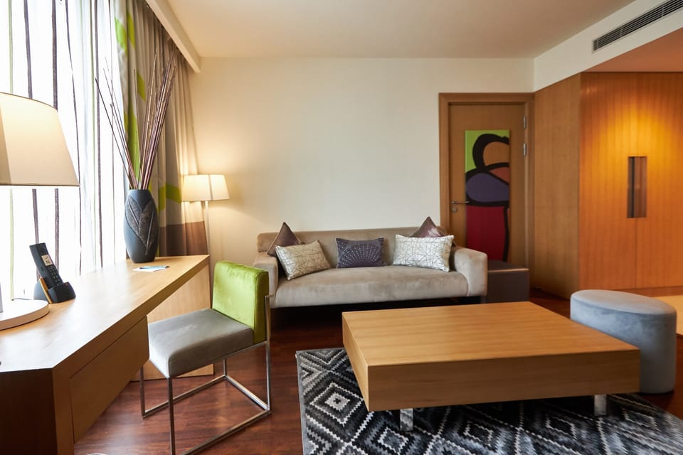 Executive Suite, 1 King Bed, Bathtub (Separate Living Room) | Premium bedding, down comforters, in-room safe, individually decorated