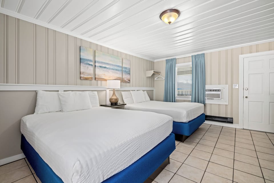 Standard Room, 2 Double Beds, Courtyard View | Free WiFi, bed sheets