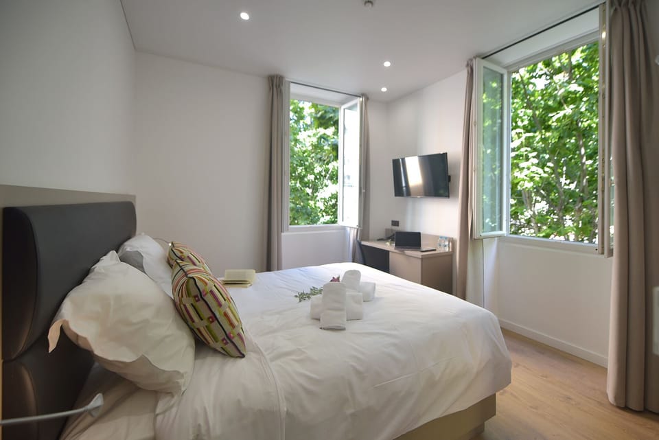 Comfort Room | Select Comfort beds, in-room safe, desk, laptop workspace