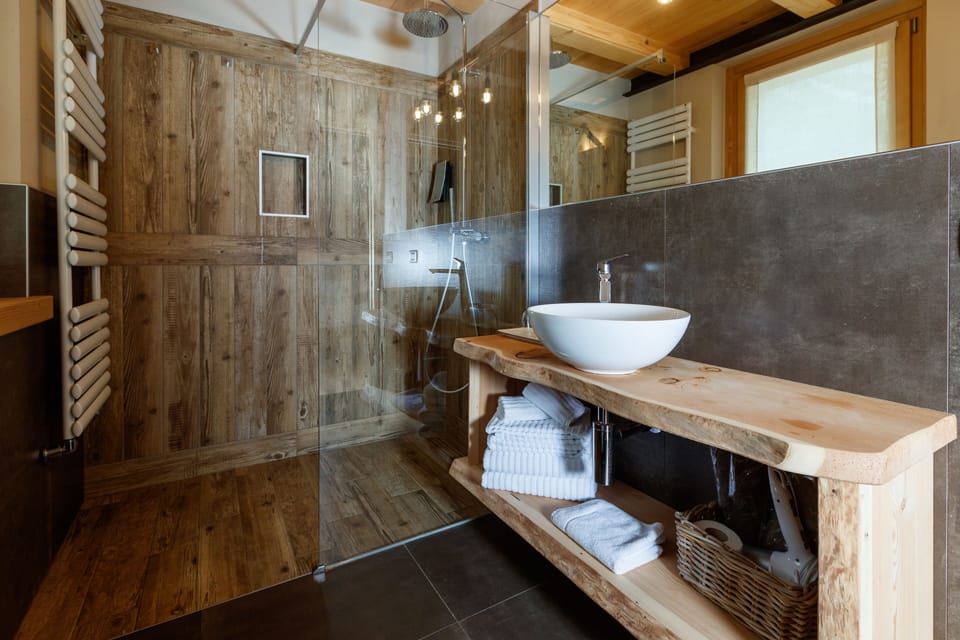 Luxury Triple Room, Mountain View | Bathroom | Rainfall showerhead, free toiletries, hair dryer, bathrobes