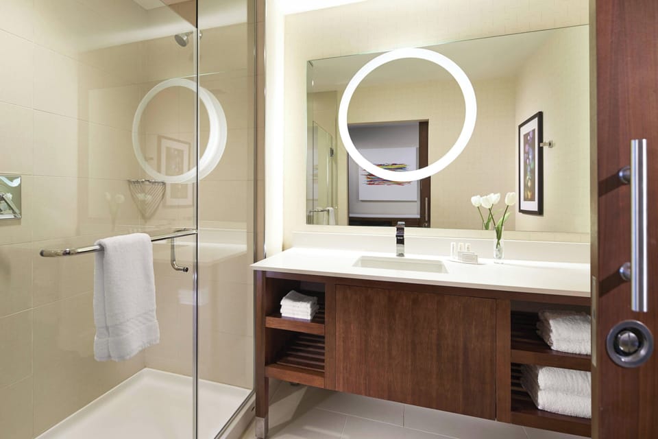 Designer toiletries, hair dryer, towels, soap