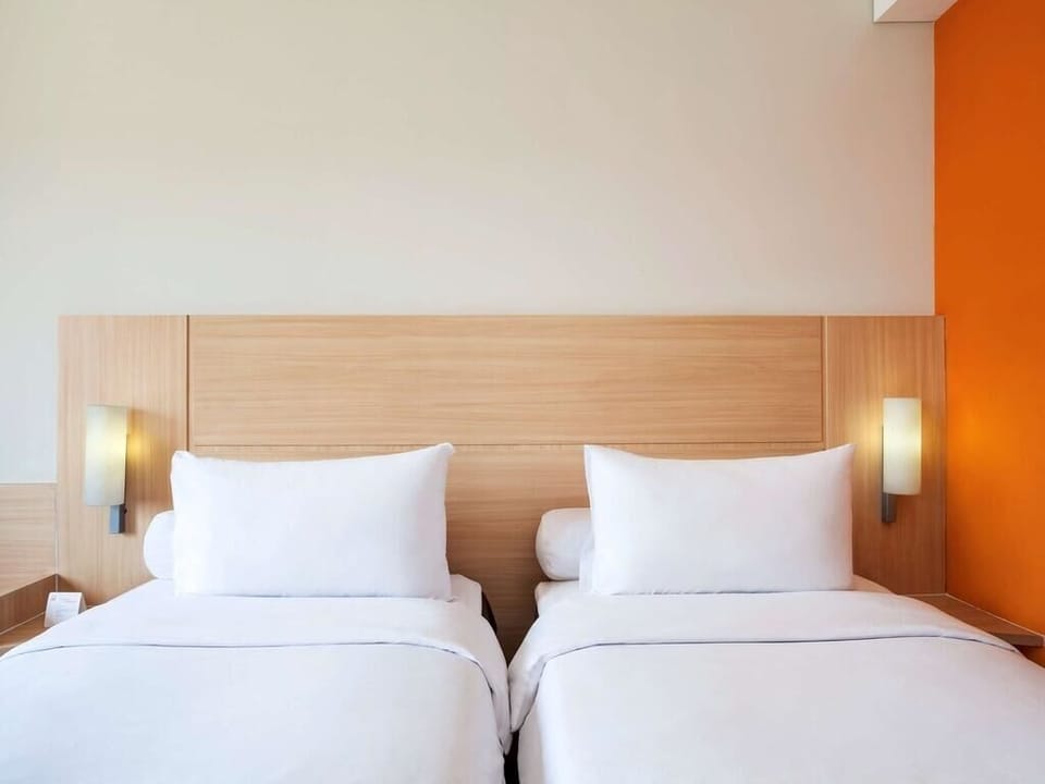 Superior Twin Room | Minibar, in-room safe, desk, soundproofing